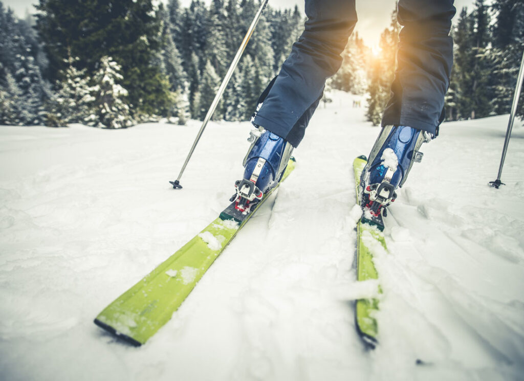 Skis on snowy path